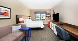 King Guestroom with Bed, Lounge Area, Room Technology, Work Desk, and Outside View