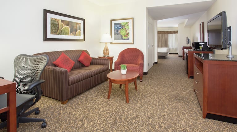 Guestroom Deluxe Suite with Work Desk, Lounge Area, and Room Technology