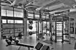 Fitness center with benches and cardio machines