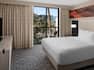 guest suite, 1 queen bed, tv, balcony view