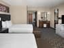 guest suite, 2 queen beds, tv, bathroom vanity
