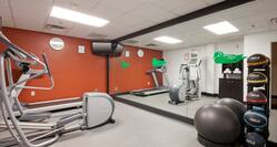 Fitness center with exercise machines and exercise balls