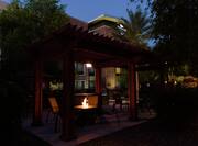 View of Outdoor Patio with Firepit at Night