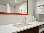 Guest Bathroom with Vanity and Mirror
