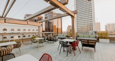 rooftop lounge, tables and chairs
