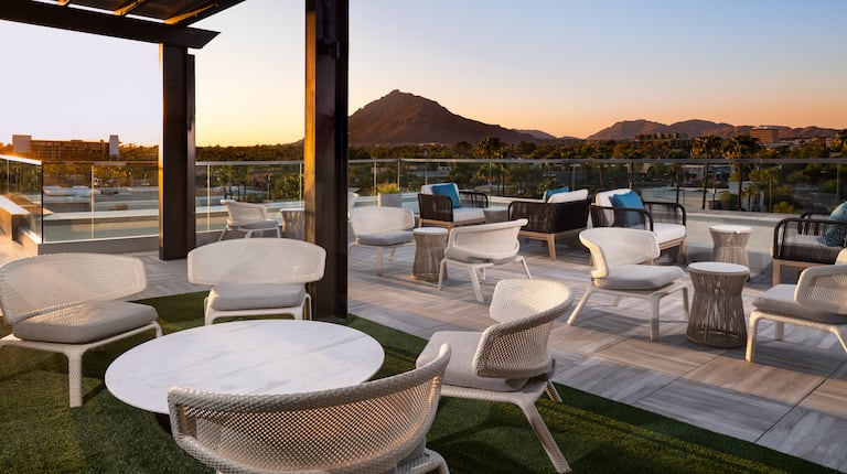 Seating Area on Hotel Terrace with View of Mountains