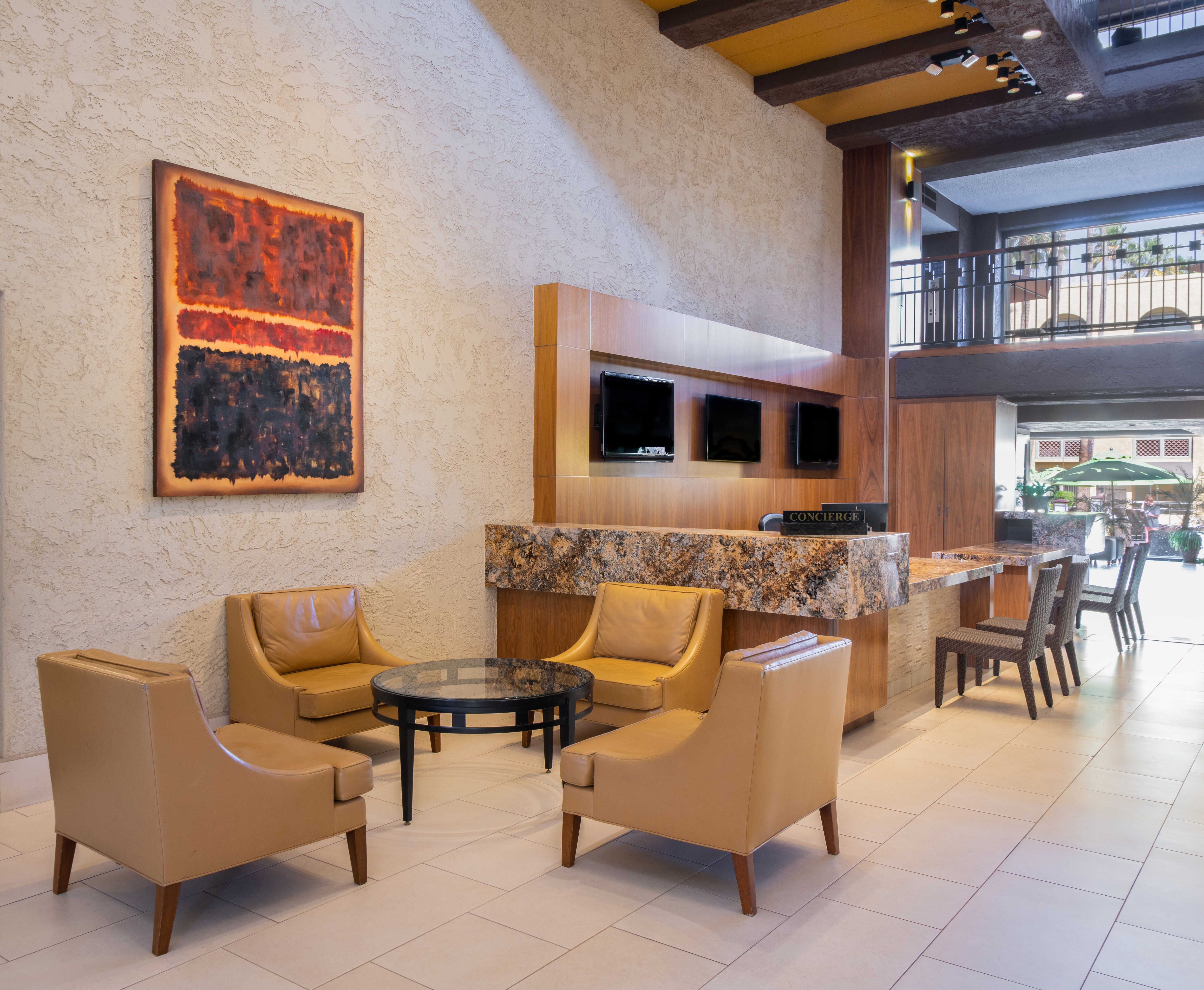 Seating area in lobby with table and chairs
