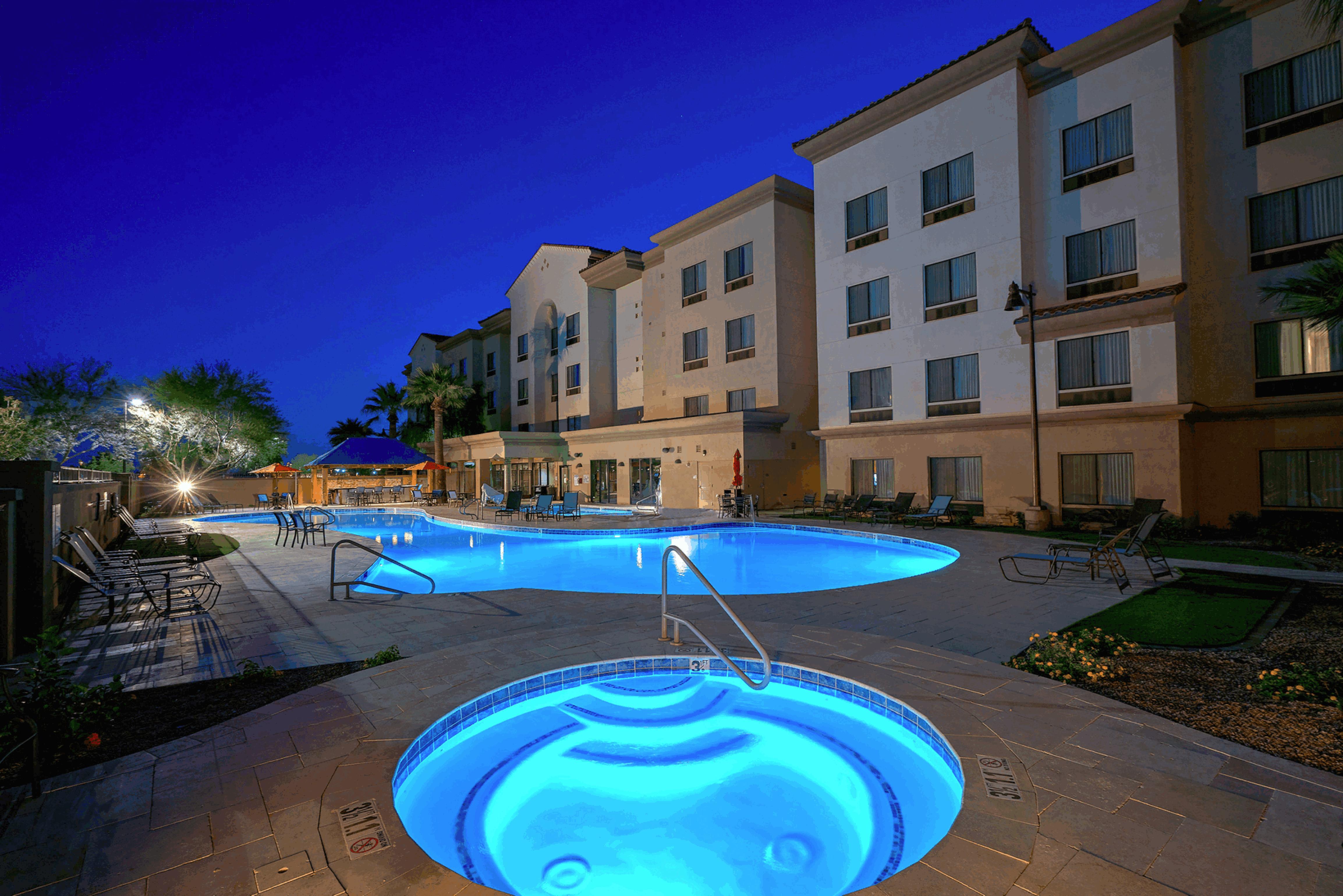 Nigh View of Outdoor Heated Pool and Hot Tub