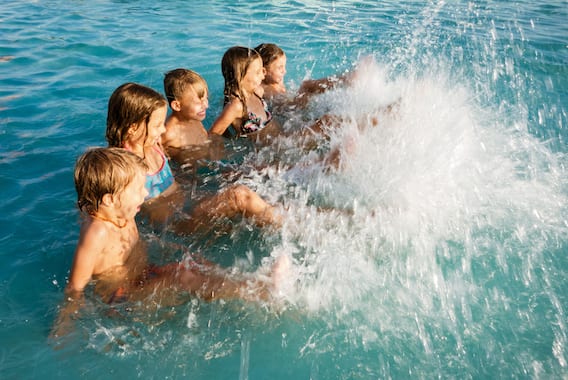 Kids splashing in water