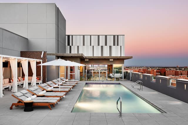 Rooftop pool with loungers