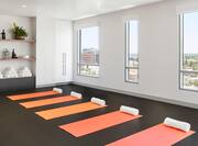 Yoga area with mats and towels