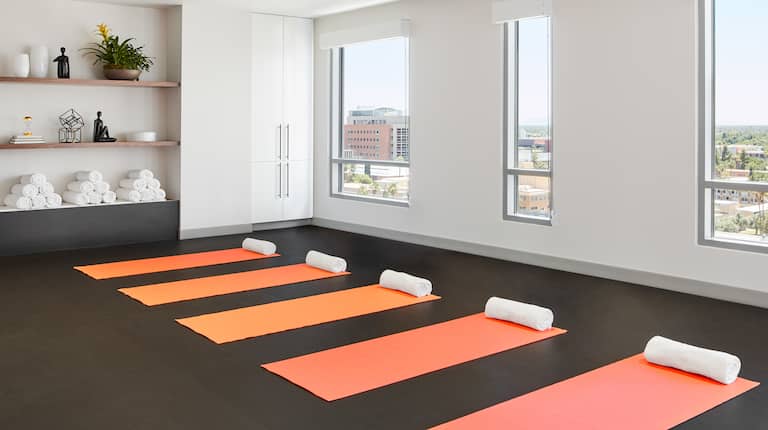 Yoga area with mats and towels