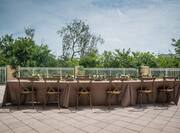 Long Table in Outdoor Patio Area with Seating for 12 Guests