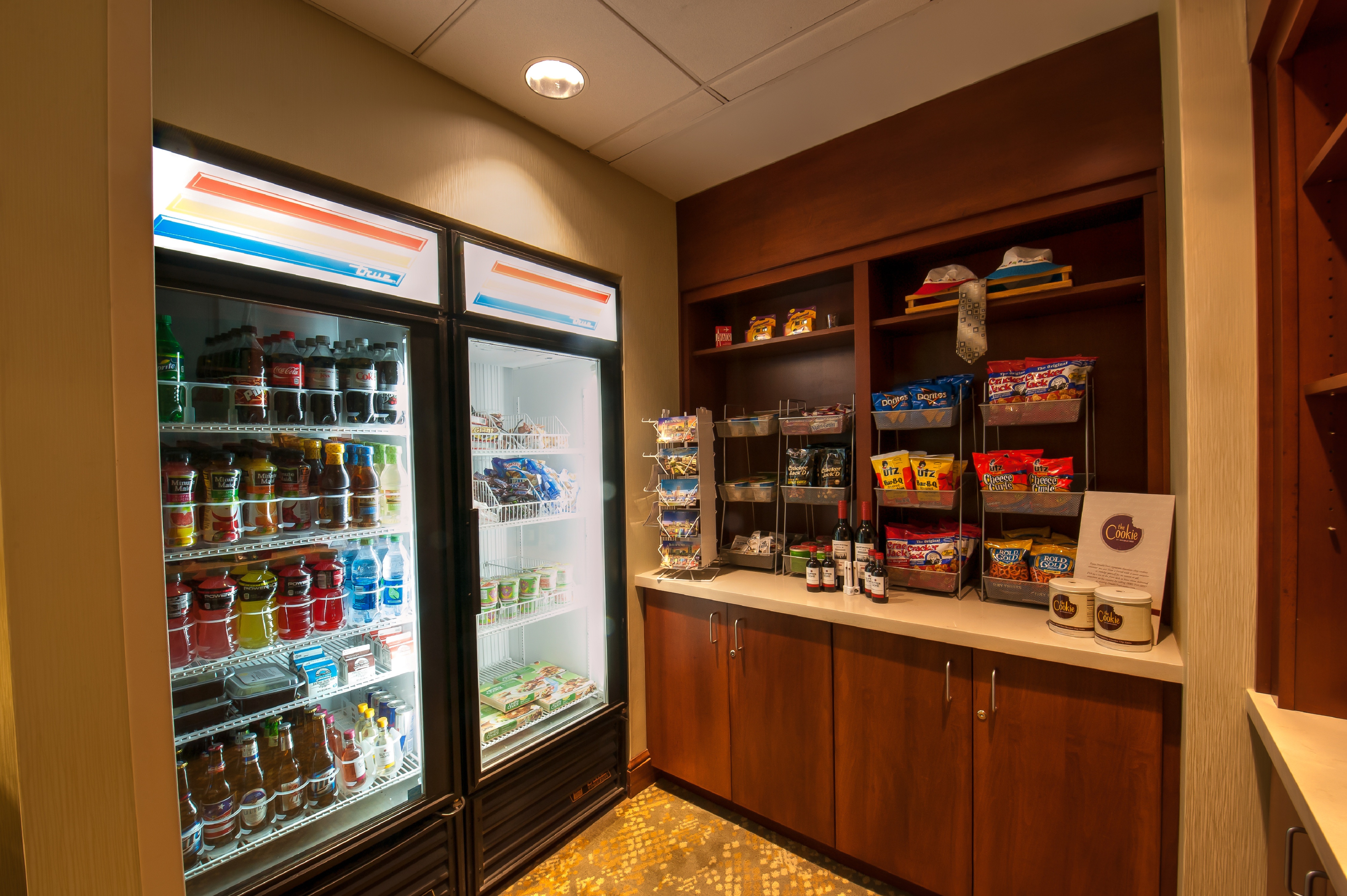 View of Cold Beverage, Snacks and Convenience Items for Guest Purchase in Pantry