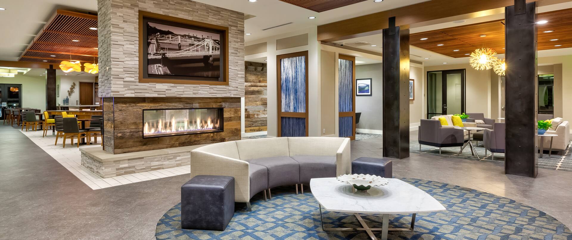 Sit back and relax by our lobby fireplace