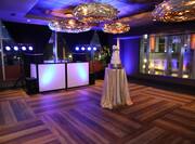 Ballroom Area with Dance Floor and Wedding Cake in Center of Dance Floor
