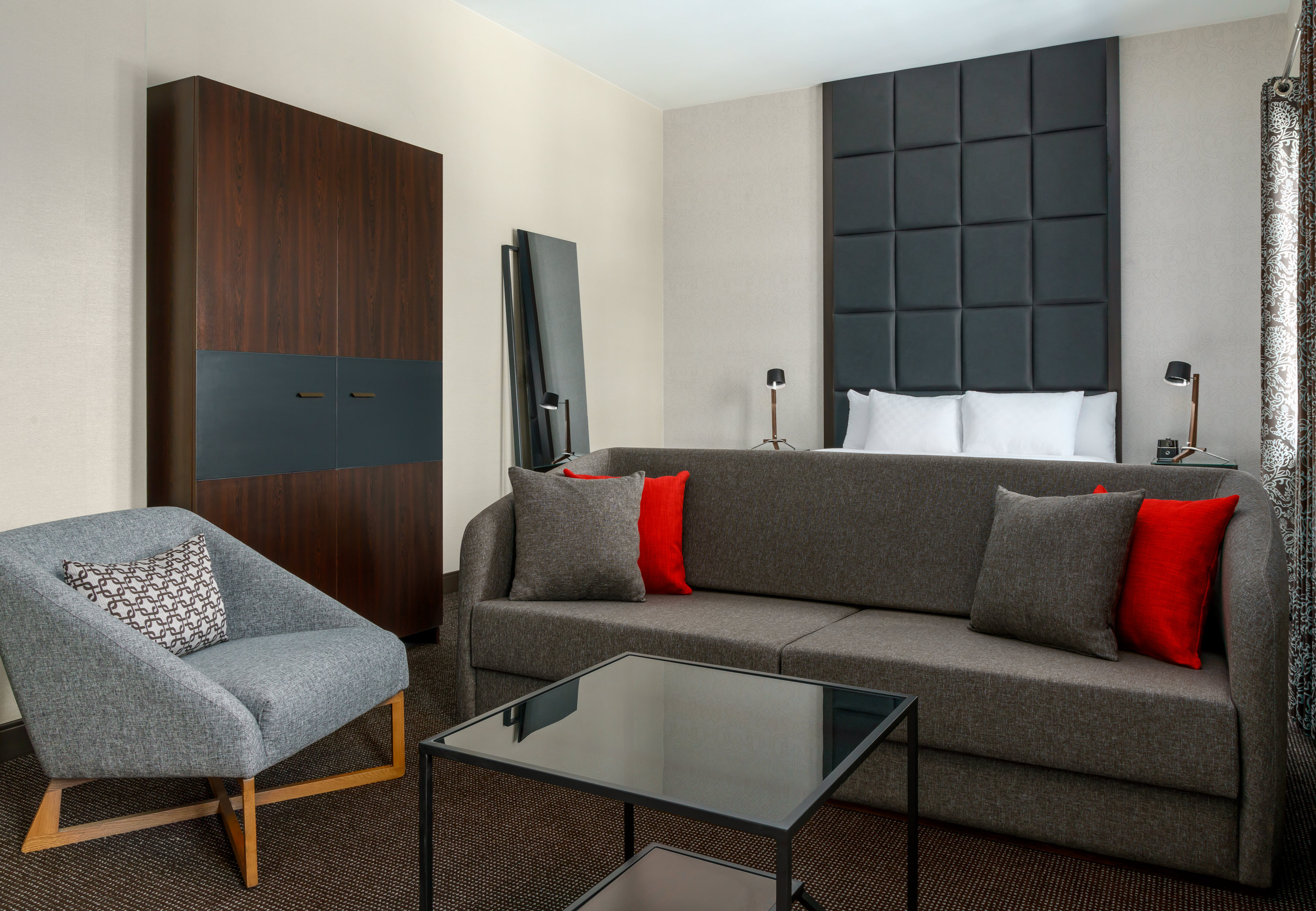 Guest Studio Suite with Sofa, Armchair and Glass Coffee Table