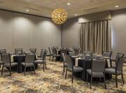 Spacious Ballroom with Round Dining Tables and Chairs