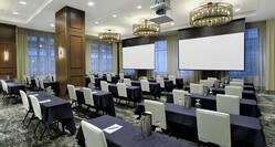 Large modren meeting room with neutral decor