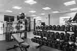 Spacious fitness center with modern weight equipment