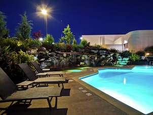 Outdoor Swimming Pool and Patio in the Evening