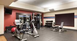 Fitness Center with Weights Treadmills and Recumbent Bikes