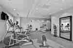 Fitness Center with Exercise Machines and Weights