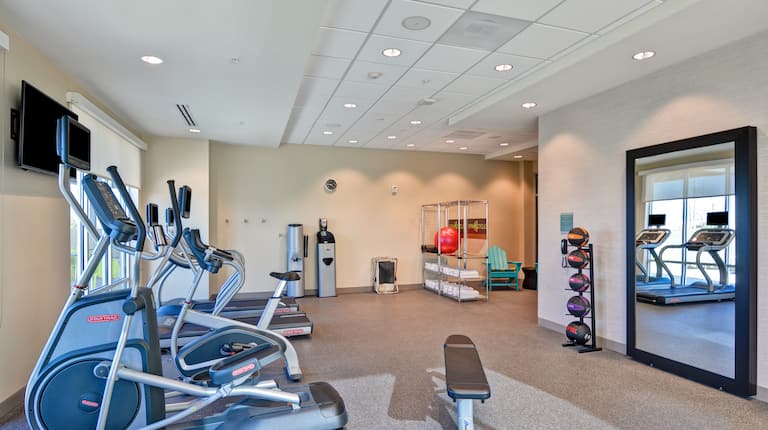 Fitness Center with Exercise Machines and Weights