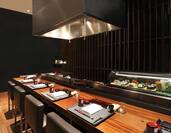 Place Settings and Counter Seating at Food Service Bar in Miyuki Japanese Restaurant
