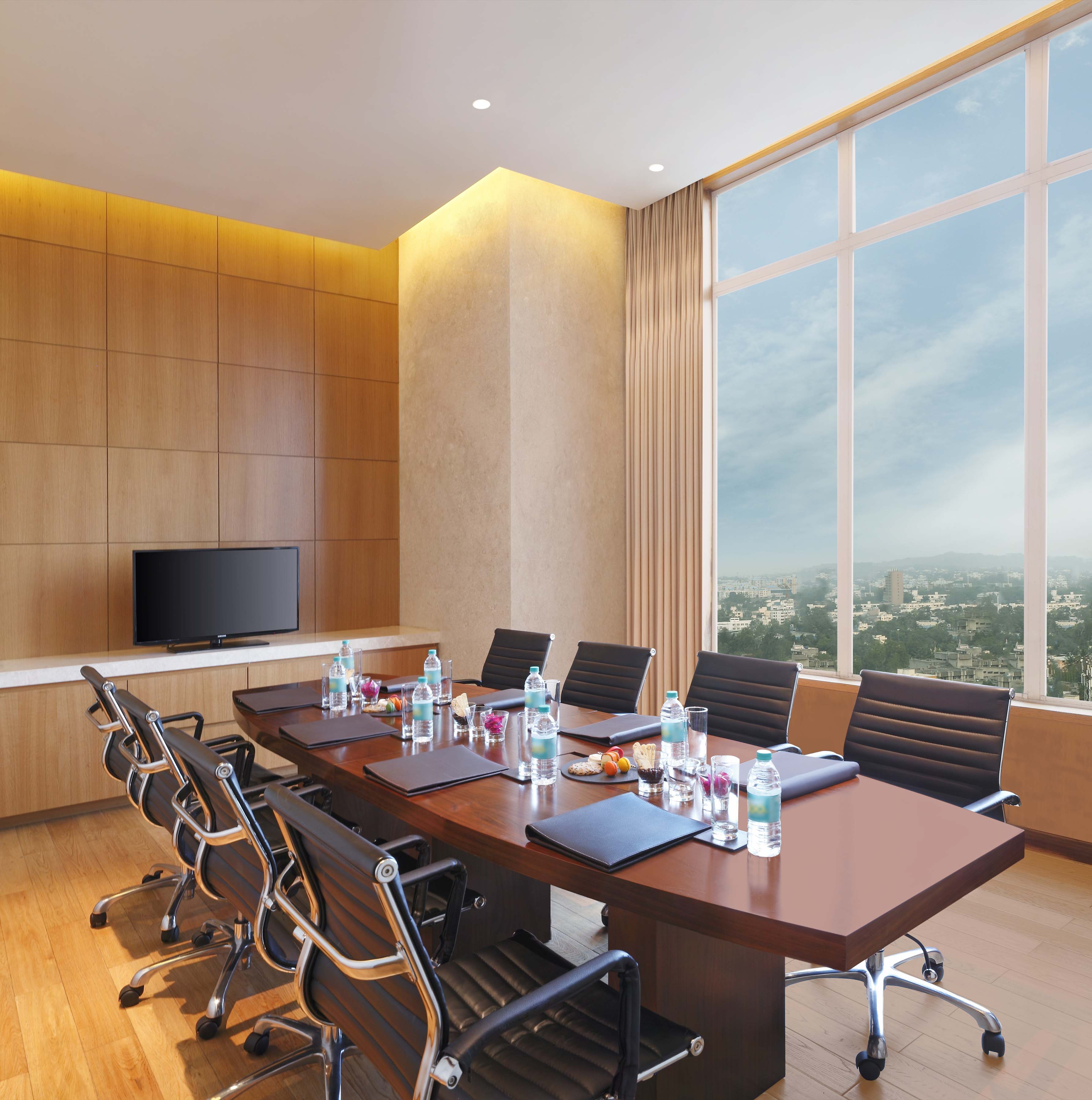 Executive Boardroom with Seating for Eight Guests HDTV and Large Window