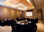 Aster Meeting Room Set up with Black Round Tables
