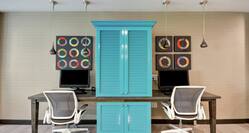 Work Desks and Colorful Cabinet in Business Center