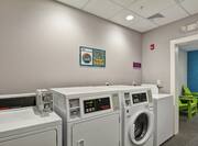 Guest Laundry Room, Machines and Seating Area