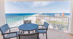 Suite balcony with lounge chairs and gulf view
