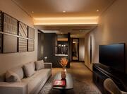 Suite Living Area with Sofa, Coffee Table and HDTV