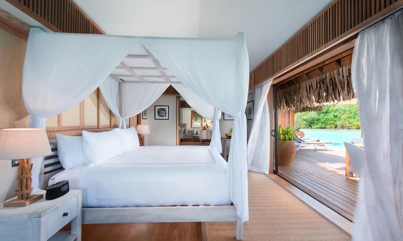 Royal Pool Overwater Villa King Bed Guestroom -next-transition