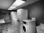 Laundry room with washers and dryers