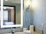 Bathroom Vanity Mirror with Reflection of Bedroom