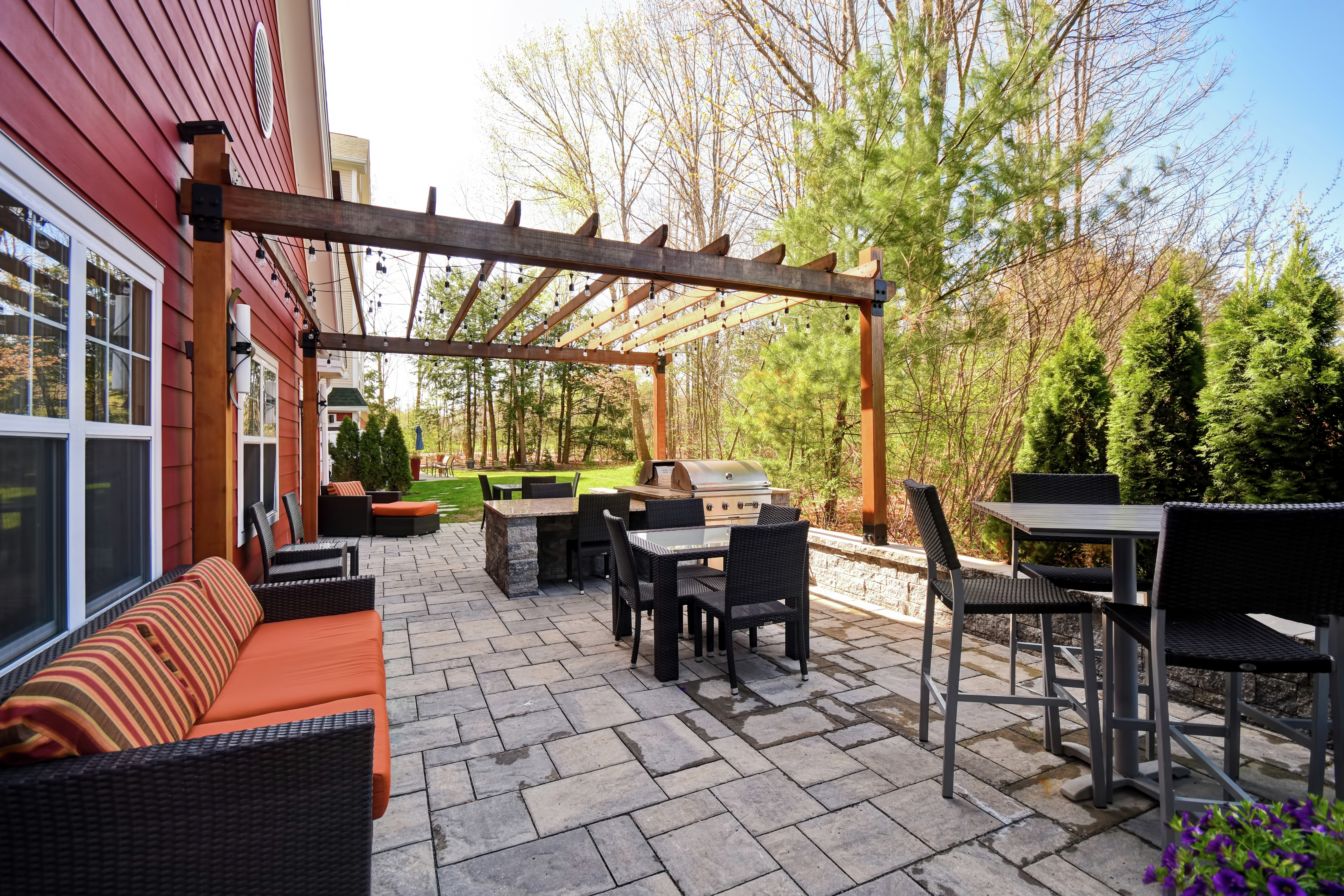 Exterior Patio Seating and Grills Daytime View