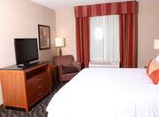 King Deluxe Suite, Bed and TV View
