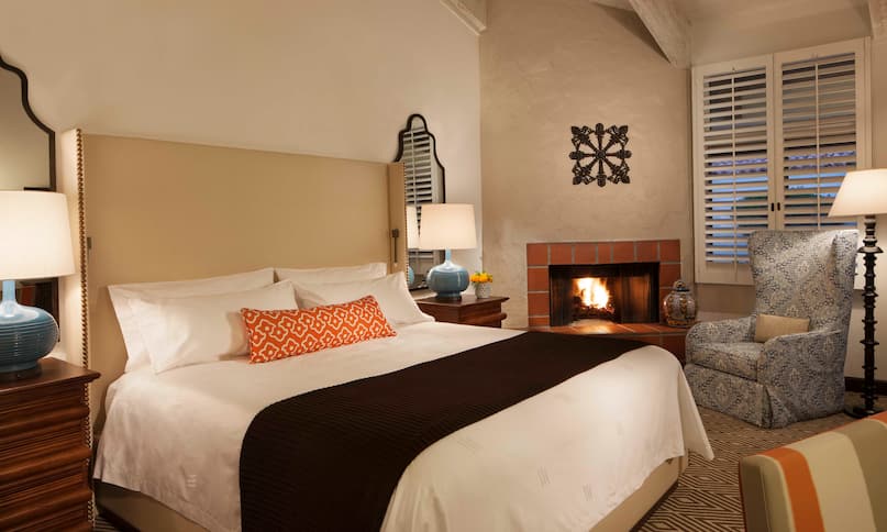 King bed and fireplace in Resort Casita-next-transition