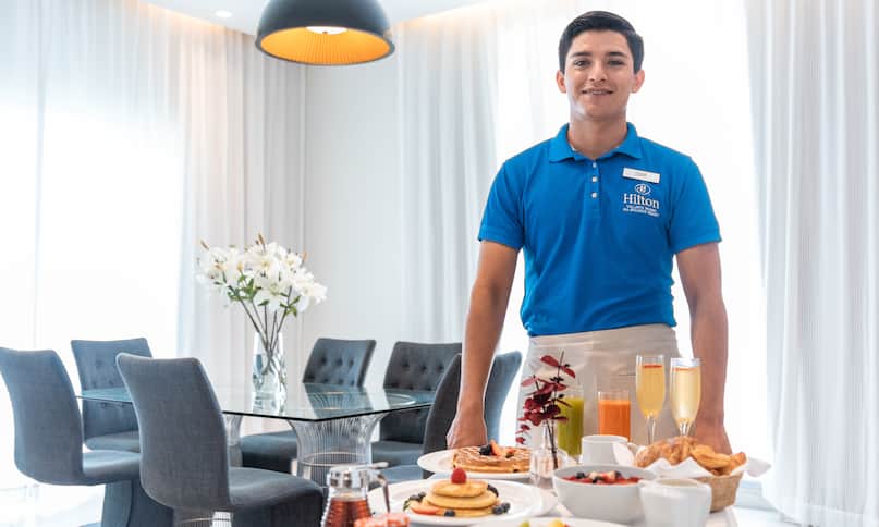hotel staff delivering room service, breakfast-previous-transition