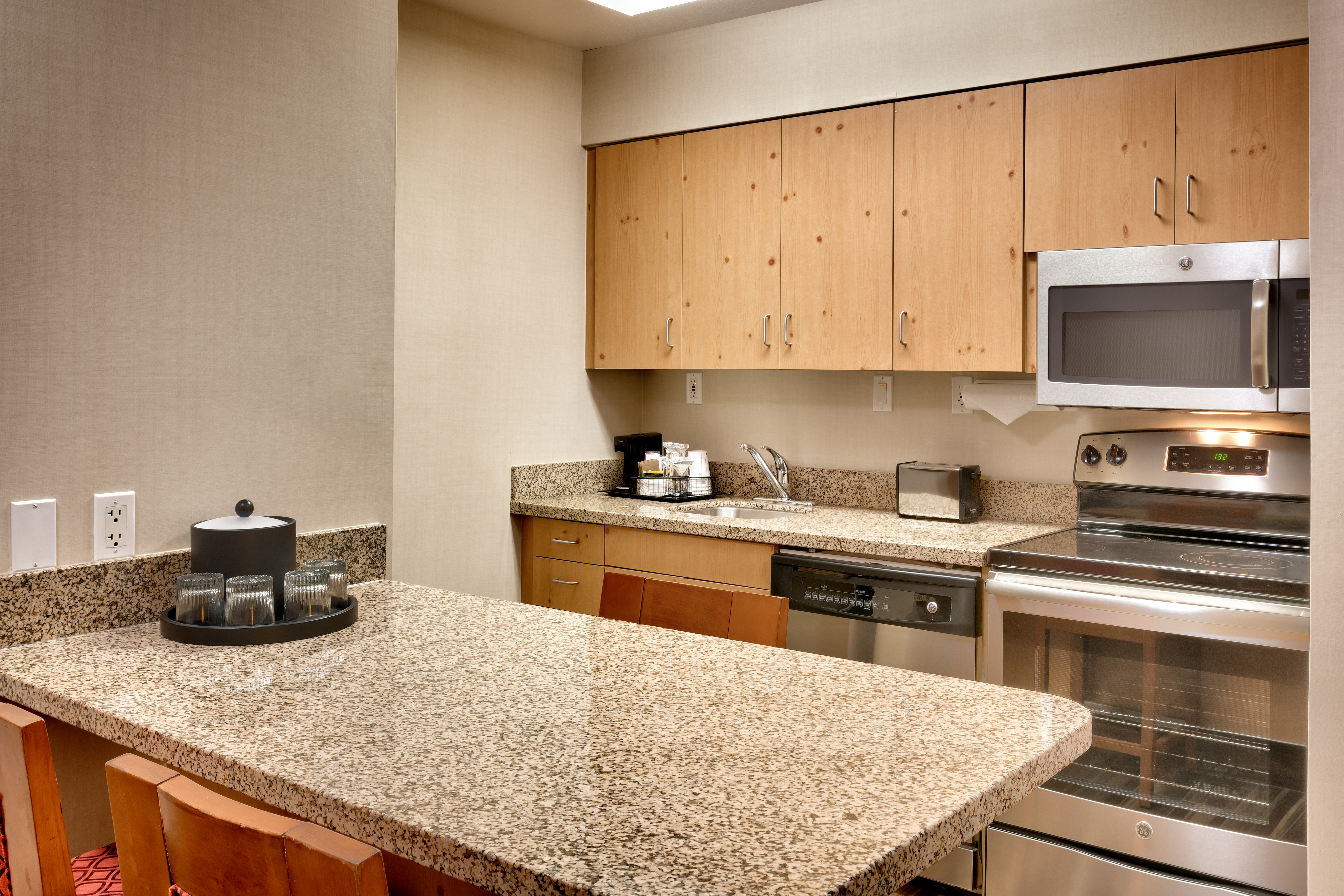 Counter Seating, DIshwasher, Microwave and Stove in Suite Kitchen