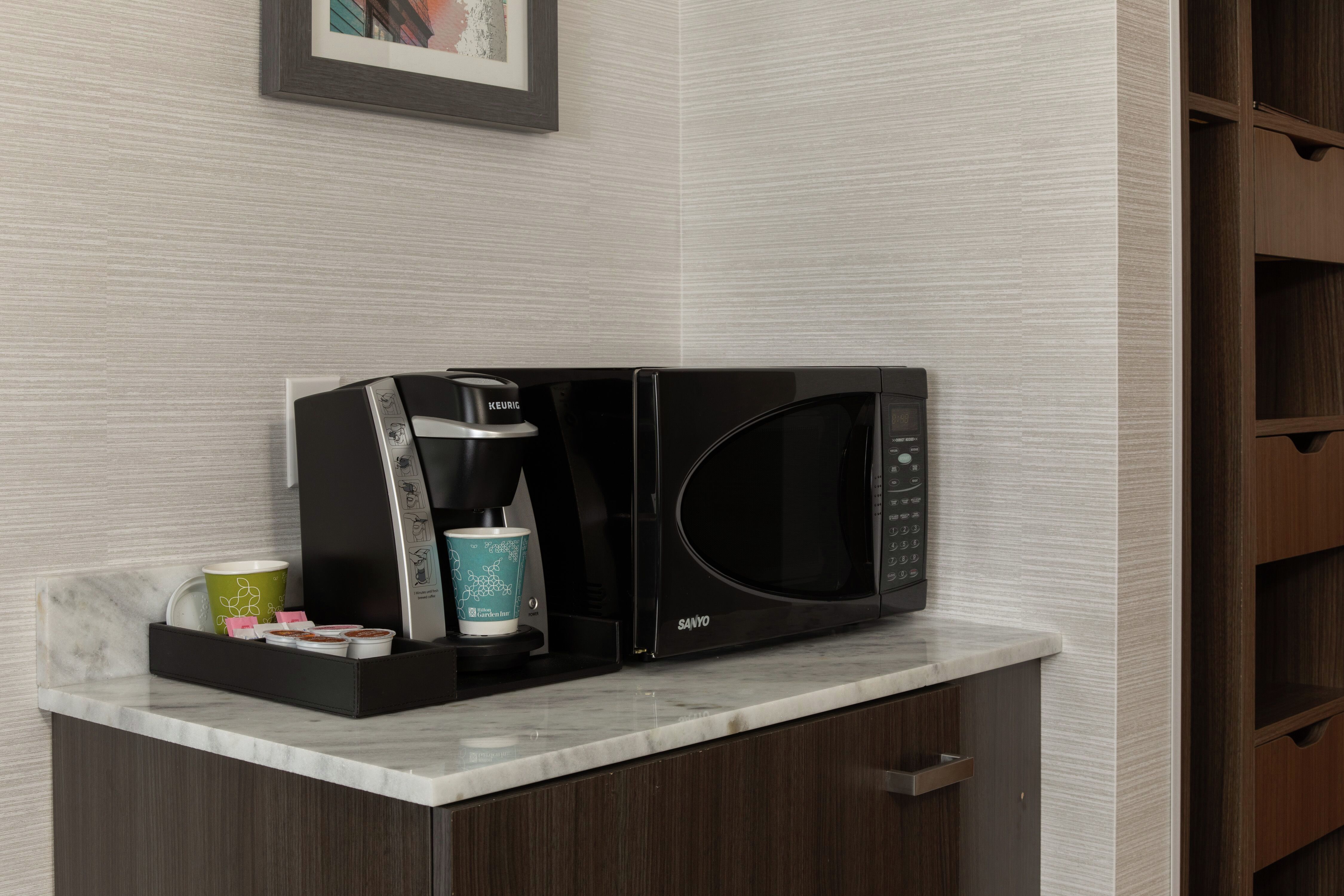 Microwave Coffemaker and Supplies in Guest Room