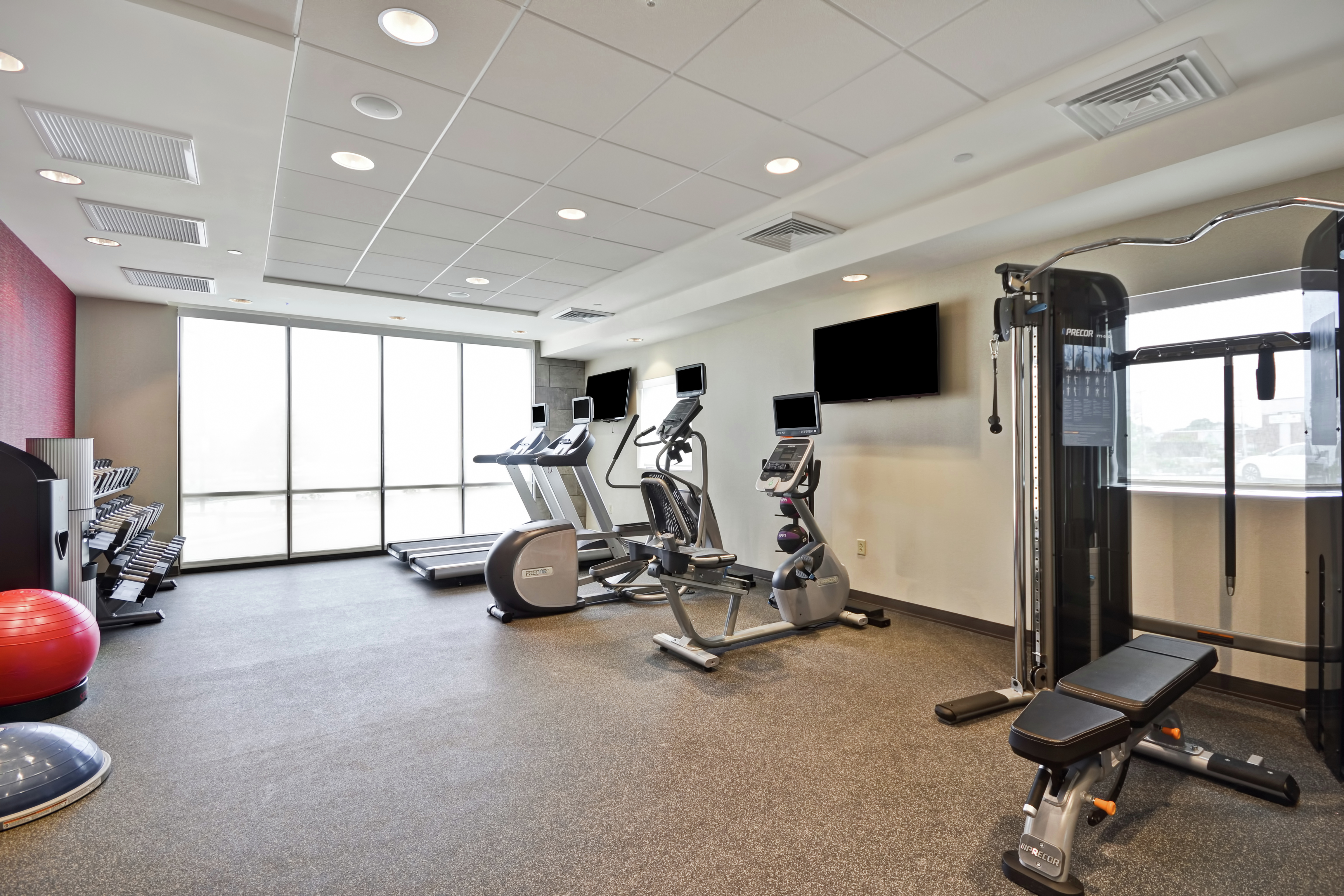 Fitness Room with Treadmills and Recumbent Bikes