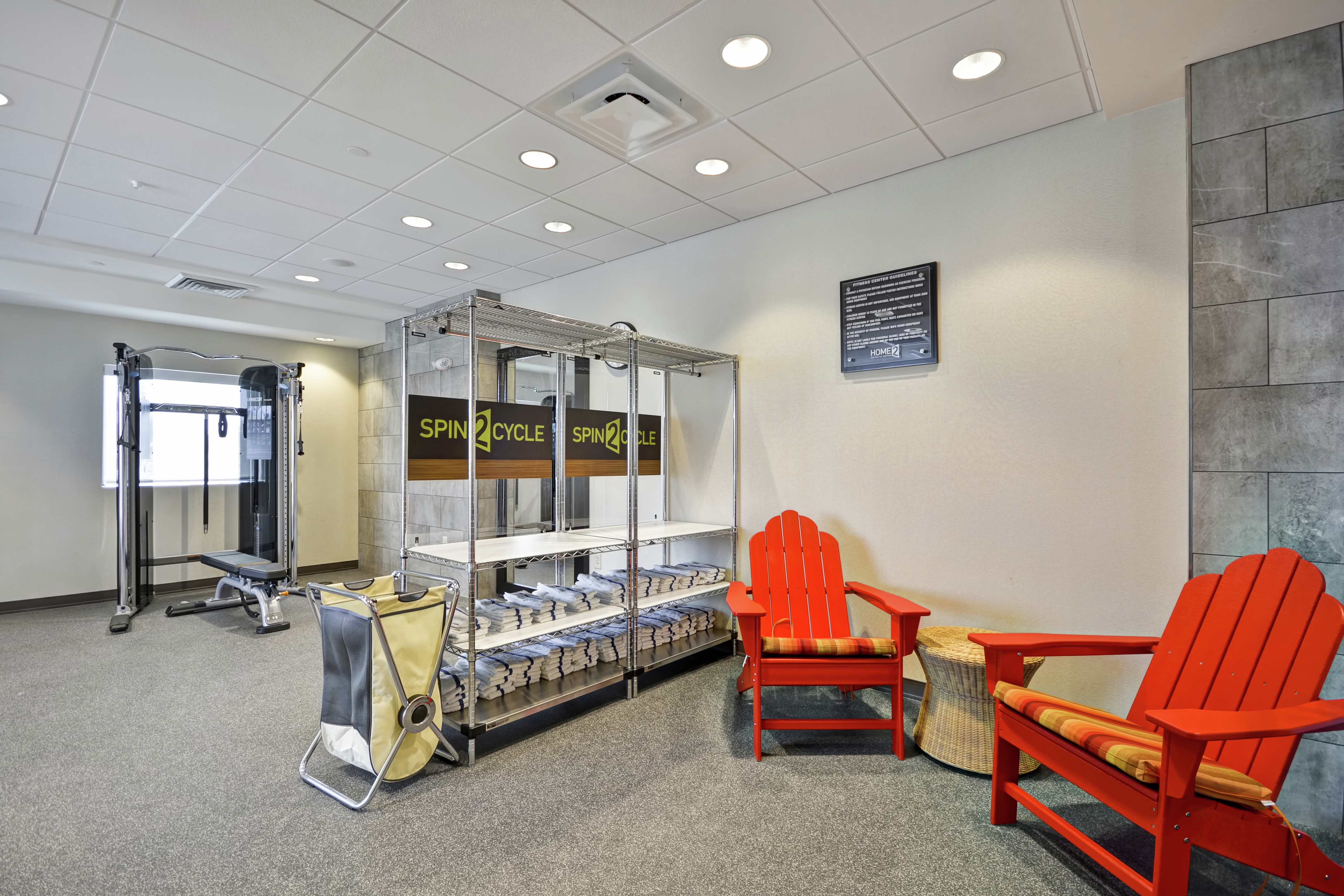 Towel Rack and Seating Area at Hotel Fitness Room