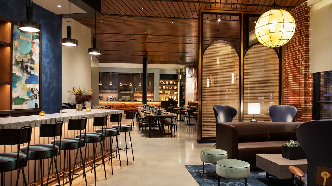 Bar area with stools and comfortable seating