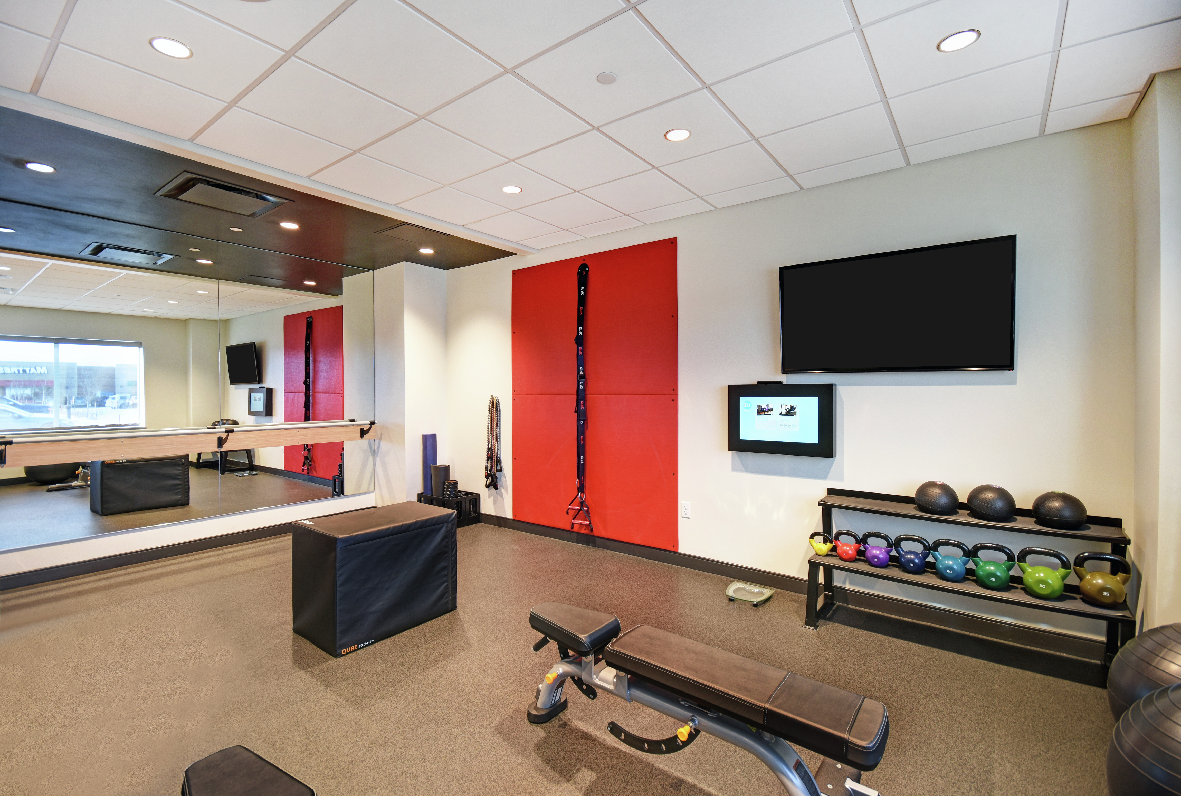 Fitness Center with Strength Exercise Equipment and TV