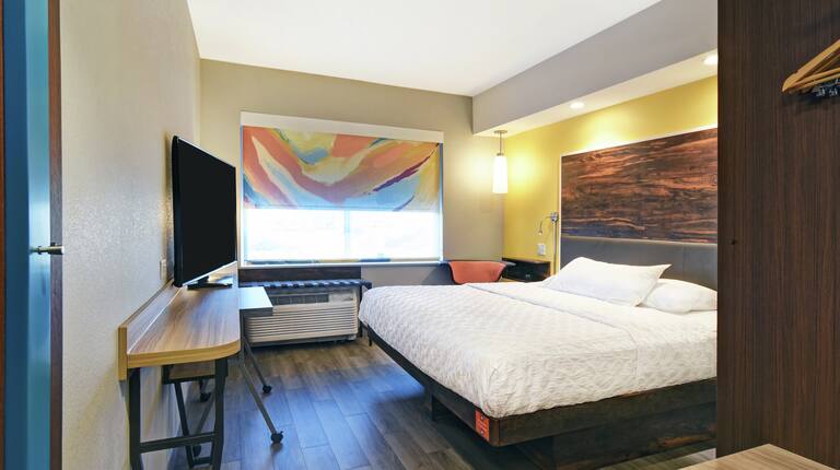 Guestroom with King Bed and Television
