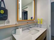 Guest Bathroom with Vanity and Mirror